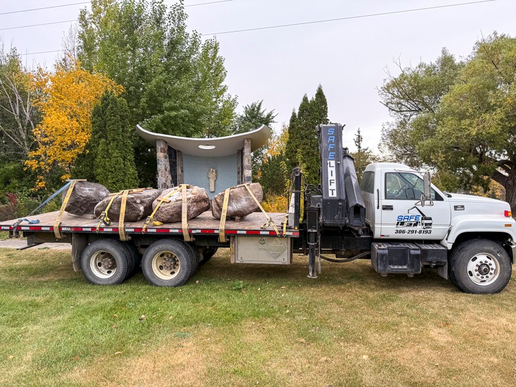 Safelift trucks loaded with stations, ready for their journey.